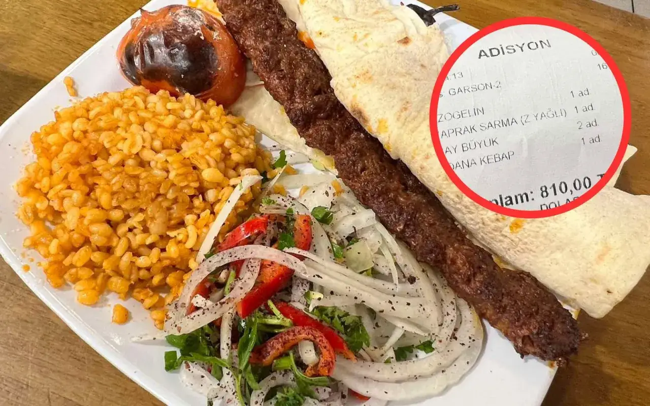 Prawdziwy turecki kebab: soczyste mięso na patyku, ryż bulgur, sałatka z cebuli i pomidora, pieczony pomidor i chlebek. Na rachunku widać